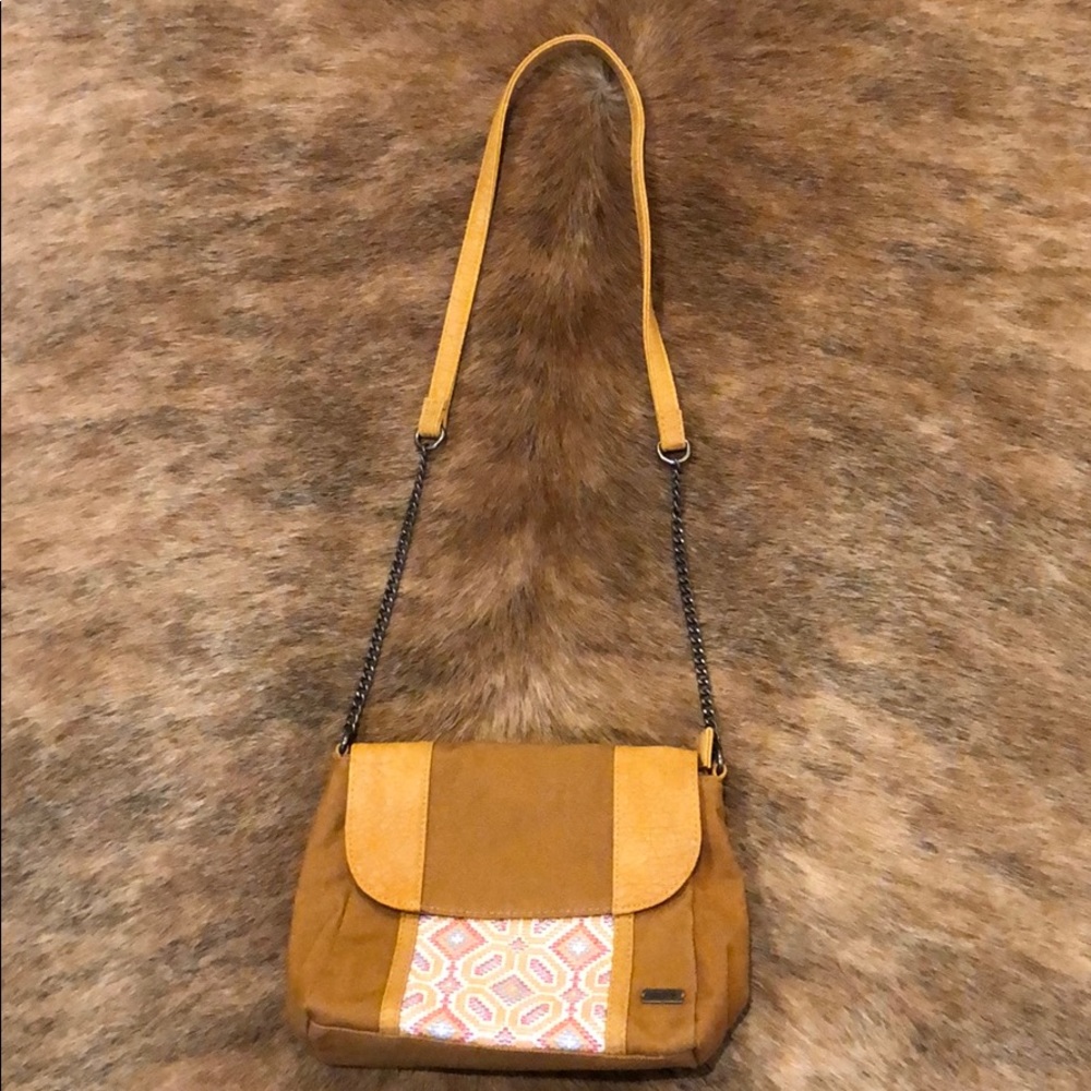 Nice brown handbag with embroidered front design.